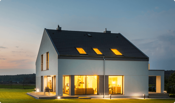 Modern home at dusk with Tapo smart home lighting